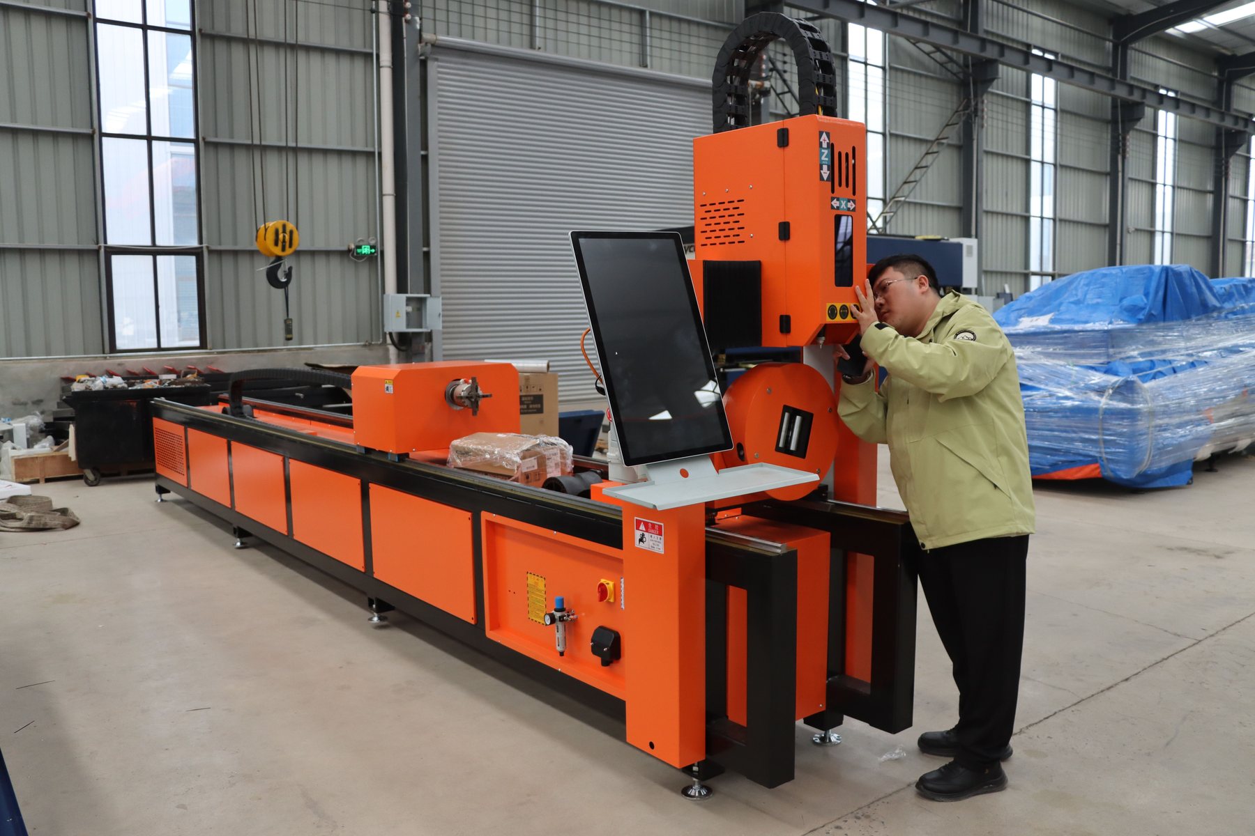 Technician inspecting industrial equipment